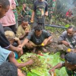 Kehangatan Kebersamaan dalam Gotong Royong Warga Kampung Bulangkop
